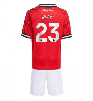 Otroški dresi Kompleti Manchester United Luke Shaw #23 Domači 2025-26